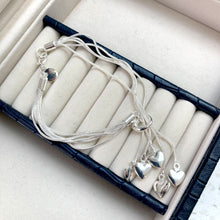 Load image into Gallery viewer, Silver plated multi heart bracelet