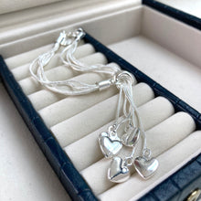 Load image into Gallery viewer, Silver plated multi heart bracelet