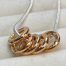 Load image into Gallery viewer, Unisex necklace with gold or silver hammered rings
