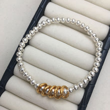 Load image into Gallery viewer, &#39;Fabulous&#39; silver bead bracelet with gold or silver hammered rings
