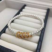Load image into Gallery viewer, &#39;Fabulous&#39; silver bead bracelet with gold or silver hammered rings
